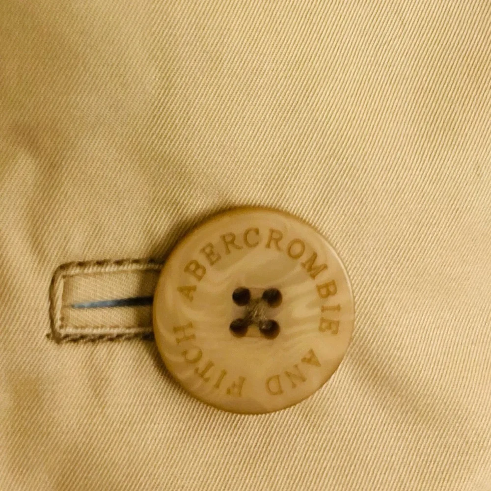 Vintage Y2K Abercrombie & Fitch tan micro mini skirt wrap skirt button front. 4